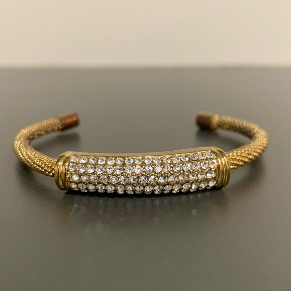 Costume gold cuff bracelet.